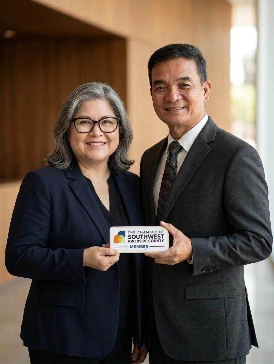 Renato and Zoraida San Juan holding their Chamber of Southwest Riverside County member sign